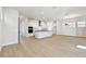 Modern kitchen features stainless steel appliances, a large island, and lots of natural light at 7266 Kodiak Ln, Sarasota, FL 34240