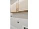 Laundry room with upper cabinets providing practical storage and clean design at 7266 Kodiak Ln, Sarasota, FL 34240