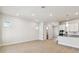 Spacious open floor plan connecting the kitchen, living room, and dining area, great for entertaining at 7266 Kodiak Ln, Sarasota, FL 34240