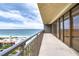 Large balcony offering panoramic ocean views at 7600 Bayshore Dr # 901, Treasure Island, FL 33706