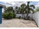 This backyard has a privacy fence and a brick paved patio at 10754 111Th N Pl, Largo, FL 33778