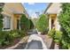 Charming townhome exterior with well-maintained landscaping and a welcoming walkway at 10814 Brickside Ct, Riverview, FL 33579