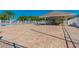 Expansive pool area with a large deck, shaded seating area, and ample space for community gatherings at 10814 Brickside Ct, Riverview, FL 33579