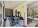 The porch is screened in and has some storage with sliding glass door at 10814 Brickside Ct, Riverview, FL 33579