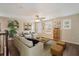 Living room with a ceiling fan, neutral furniture, and a large window at 11834 Lake Lucaya Dr, Riverview, FL 33579