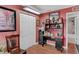 Cozy office space with built-in desk, shelving, and ample storage, perfect for working from home at 12162 Aurora Ct, Largo, FL 33774