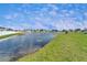 Picturesque pond view from the property, showcasing the peaceful and serene surroundings at 13006 Tidal Flats Loop, Riverview, FL 33579