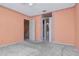 Spacious bedroom with two entryways and standard carpeting at 1321 N Mcmullen Booth Rd # 1321, Clearwater, FL 33759