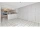 Open concept living area featuring tile flooring and a kitchen view at 1321 N Mcmullen Booth Rd # 1321, Clearwater, FL 33759