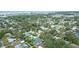 Wonderful aerial view of home, pool and beautiful surrounding neighborhood at 13922 Oak Forest N Blvd, Seminole, FL 33776