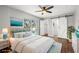 Bright main bedroom with ensuite bathroom and barn doors at 1582 Sandalwood Dr, Dunedin, FL 34698