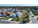 A beautiful community featuring manicured lawns, mature trees, and well-maintained homes at 1601 E Del Webb Blvd, Sun City Center, FL 33573