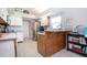Open kitchen with stainless steel appliances and bright and airy space at 1601 E Del Webb Blvd, Sun City Center, FL 33573