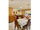 Formal dining area with decorative lighting fixture and seating for six at 1616 S Lake Ave # 4, Clearwater, FL 33756