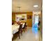 Cozy dining room with a view into the kitchen and direct access to the front door at 1616 S Lake Ave # 4, Clearwater, FL 33756