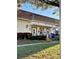 Well-maintained exterior building featuring a covered entrance, manicured landscaping, and a welcoming facade at 1616 S Lake Ave # 4, Clearwater, FL 33756