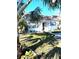 Charming single story home with manicured lawn, mature shade trees and classic exterior at 1616 S Lake Ave # 4, Clearwater, FL 33756