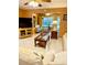 Open-concept living area with tile flooring, plush seating, and natural light at 1616 S Lake Ave # 4, Clearwater, FL 33756