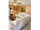 Comfortable living room with a large sectional sofa and bright, warm paint at 1616 S Lake Ave # 4, Clearwater, FL 33756