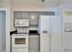 Cozy kitchen features classic appliances, ample cabinet space, and an efficient layout at 1728 Elk Spring Dr, Brandon, FL 33511