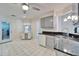 Bright breakfast nook with lots of natural light and a view to the kitchen and side entry at 1728 Elk Spring Dr, Brandon, FL 33511