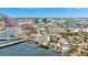 Aerial view of a waterfront condo building in an urban neighborhood with a marina and a pool at 2 Adalia Ave # 803, Tampa, FL 33606