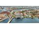 Stunning aerial view of waterfront condos with private boat slips and city skyline backdrop at 2 Adalia Ave # 803, Tampa, FL 33606