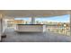 Outdoor balcony with white railing and view of palm trees and surrounding buildings at 2 Adalia Ave # 803, Tampa, FL 33606