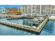 Waterfront condo building with private boat slips, city views, and dock access at 2 Adalia Ave # 803, Tampa, FL 33606