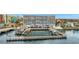 Exterior view of a waterfront condo building with a marina and easy access to waterways at 2 Adalia Ave # 803, Tampa, FL 33606