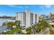 Exterior view of the condo complex showing the building's architectural style and surrounding landscaping at 2 Adalia Ave # 803, Tampa, FL 33606