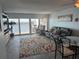 Stylish living room with sliding glass doors leading to a waterfront balcony with picturesque views at 2 Adalia Ave # 803, Tampa, FL 33606