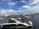 Vibrant waterfront scene with numerous boats on the water and cityscape in the background at 2 Adalia Ave # 803, Tampa, FL 33606
