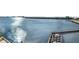 Expansive waterfront view showing a dock, calm water, and the skyline in the distance at 2 Adalia Ave # 803, Tampa, FL 33606
