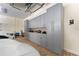 The garage features custom cabinets, ample counter space, and epoxy flooring for a clean and organized workspace at 22259 Skyview Cir, Brooksville, FL 34602