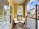 Inviting balcony features outdoor seating and charming views at 2410 W Azeele St # 220, Tampa, FL 33609