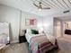 Bedroom featuring a slatted ceiling, neutral decor, and carpeted floors at 2410 W Azeele St # 220, Tampa, FL 33609