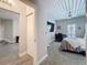 Bedroom with slatted ceilings, a ceiling fan, carpeted floors, and a large window at 2410 W Azeele St # 220, Tampa, FL 33609
