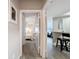 Hallway view showcasing the transition between living spaces and the bedroom at 2410 W Azeele St # 220, Tampa, FL 33609