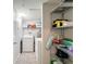 Functional laundry area with convenient shelving and storage at 2410 W Azeele St # 220, Tampa, FL 33609