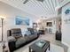 Spacious area featuring a comfortable couch and a seamless flow to the kitchen at 2410 W Azeele St # 220, Tampa, FL 33609