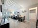 Open-concept design combining living, dining, and kitchen areas for modern living at 2410 W Azeele St # 220, Tampa, FL 33609