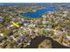 Aerial view of a home with a large waterway in the background and private access to water at 27 Park Ave, Tarpon Springs, FL 34689