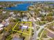 Stunning aerial view of property highlighting its location, surrounding landscape and waterfront proximity at 27 Park Ave, Tarpon Springs, FL 34689