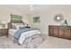 Comfortable bedroom with neutral tones, soft lighting, and modern furniture for a relaxing retreat at 27 Park Ave, Tarpon Springs, FL 34689