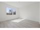 Minimalist bedroom with large windows and bright lighting at 305 15Th N St, St Petersburg, FL 33705