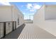 Wide rooftop deck with modern railings and outdoor space at 305 15Th N St, St Petersburg, FL 33705