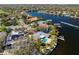 Waterfront home with private pool and boat dock surrounded by lush landscaping and scenic water views at 3399 Maple Ne St, St Petersburg, FL 33704