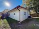 Exterior view of the house highlights the yard, and well-maintained home at 3501 Beechwood N Ter, Pinellas Park, FL 33781