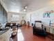 Cozy living room with wood floors, comfortable seating, and unique decor for a relaxed atmosphere at 3501 Beechwood N Ter, Pinellas Park, FL 33781